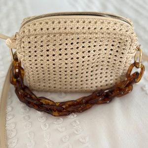 Clare V ecru woven bag with tortoise shortie strap